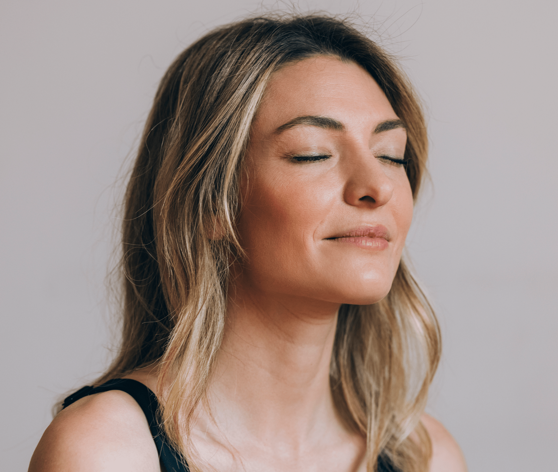 woman with her eyes closed