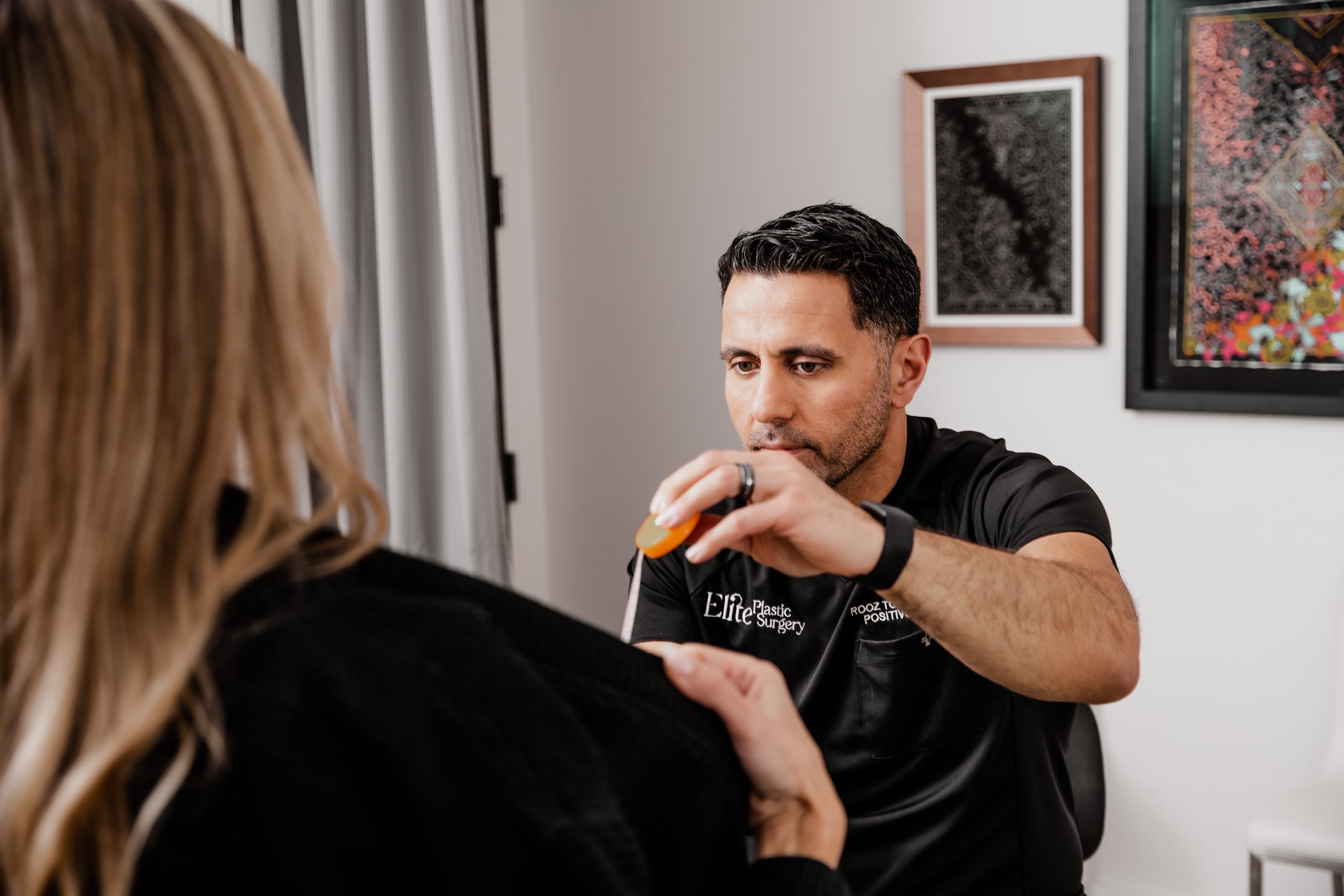Dr. Torabi with a patient